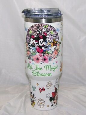 Disney Mickey and Friends white 40oz stainless steel tumbler with a handle.